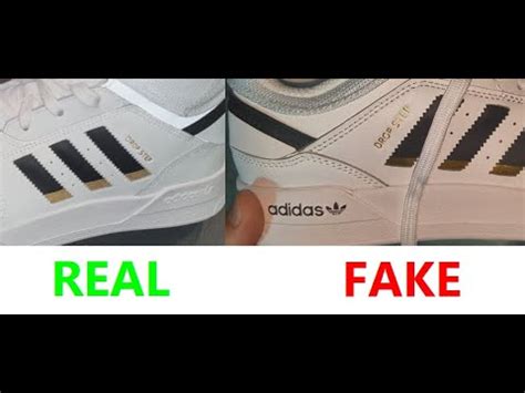 fake adidas pants with two stripes|how to identify adidas counterfeit.